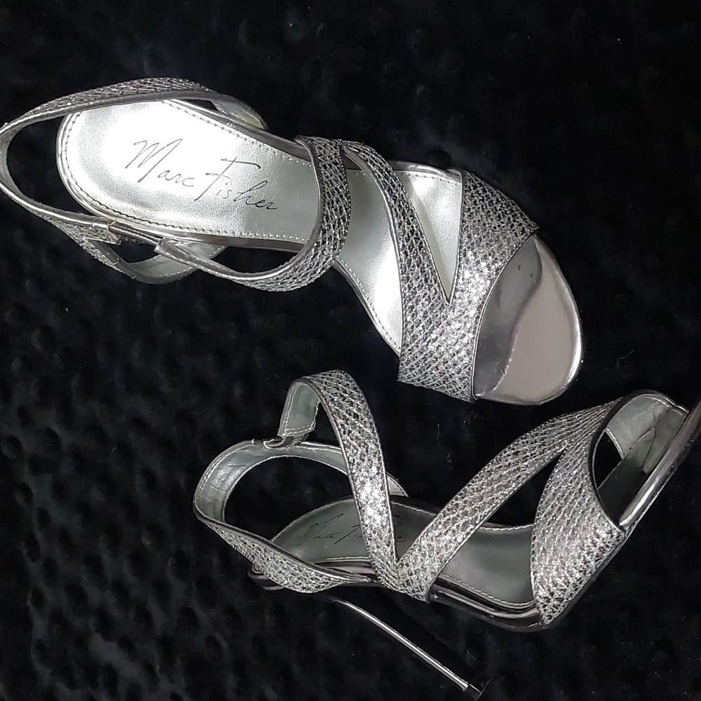 Marc Fisher silver heels. Very cute! Reposhing because I have too many shoes.